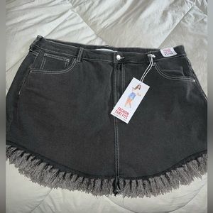 Super cute black jean skirt with fringe